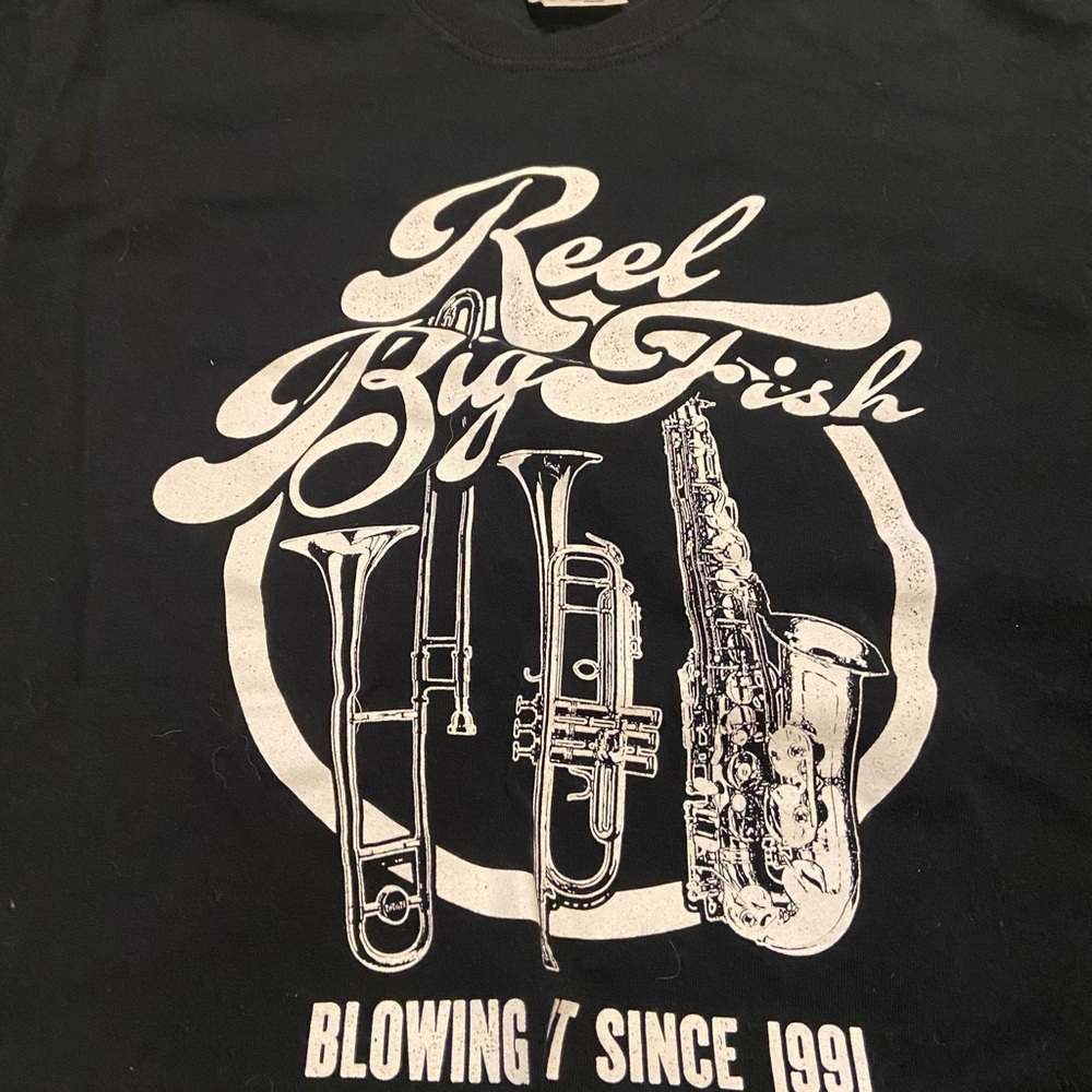 Lot of misc. band tees and racer backs. All size am/med
